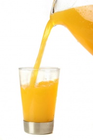 倒橙汁酒水饮料图片