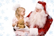 圣诞老人抱着小女孩图片