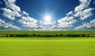 绿色平原蓝天白云图片